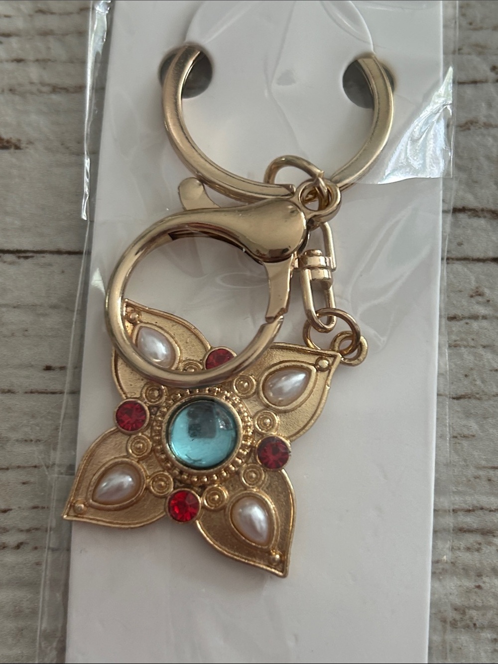 🔥$2 Gold-Tone Floral Jewel Keychain with Aqua Center